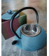 Blauwe gietijzeren theepot
