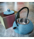 Blauwe gietijzeren theepot